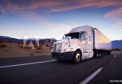 Fototapeta145 x 100  Truck and highway at sunset  transportation background, 145 x 100 cm