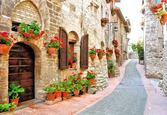 Fototapeta174 x 120  Picturesque lane with flowers in an Italian hill town, 174 x 120 cm