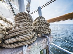 Fototapeta pltno 330 x 244, 63459591 - Wooden pulley and ropes on old yacht. - Devn kladka a lana na star jacht.