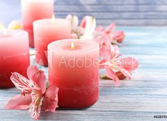 Fototapeta papr 160 x 116, 63874367 - Beautiful candles with flowers on wooden background