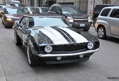 Fototapeta vliesov 145 x 100, 65500972 - American muscle car on a street in Chicago - Americk svalov auto na ulici v Chicagu