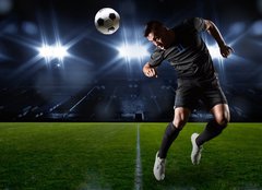 Fototapeta pltno 240 x 174, 66124797 - Hispanic Soccer Player heading the ball - Hispnsk fotbalista m m