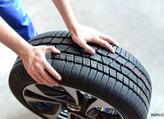 Fototapeta papr 254 x 184, 66921054 - Reifenwechsel in einer KFZ Werkstatt // Tire change by mechanic