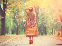 Fototapeta330 x 244  Redhead girl with suitcase in the autumn park., 330 x 244 cm