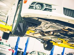 Fototapeta papr 360 x 266, 69826596 - Lifted Car Maintenance