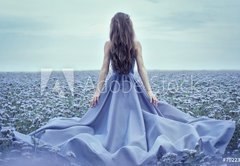 Fototapeta174 x 120  Back view of standing young woman in blue dress, 174 x 120 cm