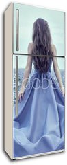 Samolepka na lednici fólie 80 x 200, 70223866 - Back view of standing young woman in blue dress - Zadní pohled na stojící mladá žena v modrých šatech