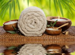 Fototapeta100 x 73  Spa background with rolled towel, bamboo and candlelight, 100 x 73 cm