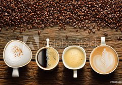 Fototapeta papr 184 x 128, 70894369 - Variety of cups of coffee and coffee beans on old wooden table