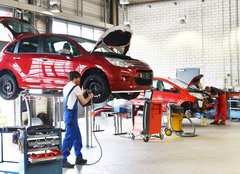 Fototapeta papr 254 x 184, 71143570 - Reifenwechsel in einer KFZ Werkstatt // Tire change by mechanic - Reifenwechsel in einer KFZ Werkstatt // Zmna pneumatik mechanikem