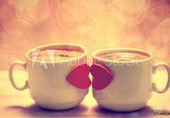 Fototapeta papr 184 x 128, 71449240 - Two coffee cups with red hearts as a kissing lips