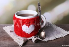 Samolepka flie 145 x 100, 71618914 - Cup of tasty hot tea, on wooden table, on light background