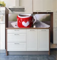 Fototapeta do kuchyn flie 180 x 60, 71618914 - Cup of tasty hot tea, on wooden table, on light background