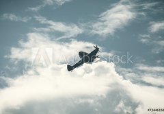 Fototapeta145 x 100  Fighter plane on cloudy sky, 145 x 100 cm