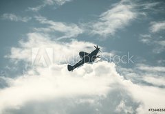 Fototapeta pltno 174 x 120, 72446158 - Fighter plane on cloudy sky