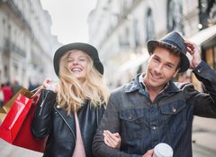 Fototapeta papr 254 x 184, 73082642 - a trendy young couple  wearing hats walking in the city in autum