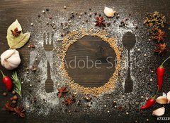 Fototapeta vliesov 100 x 73, 73223520 - Spices on table with cutlery silhouette, close-up - Koen na stl s pbory silueta, zavete