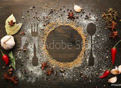 Fototapeta papr 254 x 184, 73223520 - Spices on table with cutlery silhouette, close-up