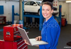 Samolepka flie 145 x 100, 76801978 - Mechanic typing on a laptop