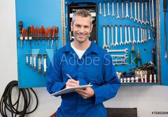 Fototapeta papr 184 x 128, 76802696 - Smiling mechanic looking at camera