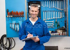 Fototapeta papr 254 x 184, 76802696 - Smiling mechanic looking at camera