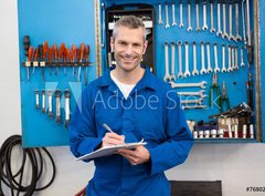Fototapeta pltno 330 x 244, 76802696 - Smiling mechanic looking at camera