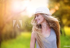 Fototapeta174 x 120  Beautiful woman outside in a park., 174 x 120 cm