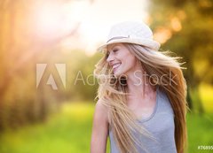 Fototapeta200 x 144  Beautiful woman outside in a park., 200 x 144 cm