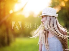 Fototapeta330 x 244  Beautiful woman outside in a park., 330 x 244 cm
