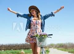 Fototapeta160 x 116  Beautiful young woman with a vintage bike in the field., 160 x 116 cm