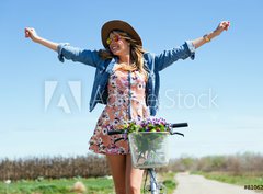 Fototapeta360 x 266  Beautiful young woman with a vintage bike in the field., 360 x 266 cm