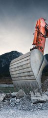 Samolepka na dvee flie 90 x 220, 81423741 - heavy organge excavator with shovel standing on hill with rocks