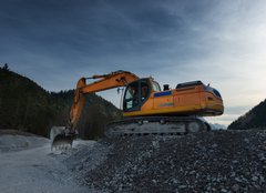 Fototapeta papr 254 x 184, 81767537 - sideview of huge orange shovel excavator digging in gravel