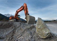 Fototapeta100 x 73  huge shovel excavator standing on gravel hill with stone rock, 100 x 73 cm