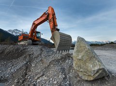 Fototapeta330 x 244  huge shovel excavator standing on gravel hill with stone rock, 330 x 244 cm