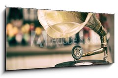 Sklenn obraz 1D panorama - 120 x 50 cm F_AB195074759 - Retro old gramophone radio. Vintage style toned photo