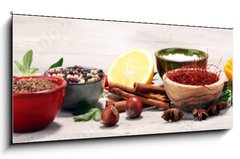 Sklenn obraz 1D panorama - 120 x 50 cm F_AB201764347 - Spices and herbs on table. Food and cuisine ingredients.