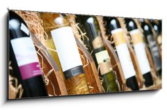 Sklenn obraz 1D panorama - 120 x 50 cm F_AB20727251 - Closeup shot of wineshelf. Bottles lay over straw. - Detailn zbr z vinrny. Lhve leely pes slmu.