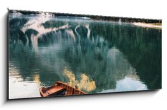 Skleněný obraz 1D panorama - 120 x 50 cm F_AB229338349 - Boats and slip construction in Braies lake with crystal water in background of Seekofel mountain in Dolomites in morning, Italy Pragser Wildsee - Lodě a skluzová konstrukce v jezeře Braies s křišťálovou vodou v pozadí hory Seekofel v Dolomitech ráno, Itálie Pragser Wildsee