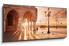 Skleněný obraz 1D panorama - 120 x 50 cm F_AB261752834 - San Marco in Venice, Italy at a dramatic sunrise - San Marco v Benátkách, Itálie za dramatického východu slunce