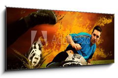 Obraz   Football player in fires flame on the outdoors field, 120 x 50 cm