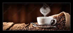 Obraz 1D panorama - 120 x 50 cm F_AB286399259 - White Cup Of Hot Coffee With Heart Shaped Steam On Old Weathered Table With Burlap Sack And Beans