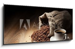 Obraz   Coffee cup with burlap sack of roasted beans on rustic table, 120 x 50 cm