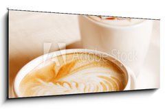 Skleněný obraz 1D panorama - 120 x 50 cm F_AB41936677 - Coffee cup with artistic cream decoration - Kávový šálek s uměleckou krémovou výzdobou