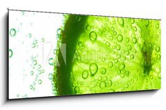Skleněný obraz 1D - 120 x 50 cm F_AB42017906 - lime slice in water - vápnitý plátek ve vodě