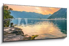 Obraz 1D panorama - 120 x 50 cm F_AB53739902 - Sunset on the sea with the  foggy mountains - Zpad slunce na moi s mlnmi horami