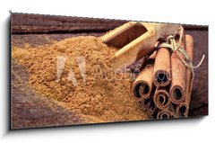 Obraz 1D panorama - 120 x 50 cm F_AB59745176 - Cinnamon sticks and cinnamon powder - Skoice a skoice