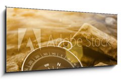 Sklenn obraz 1D panorama - 120 x 50 cm F_AB60262537 - compass on the shore at sunrise