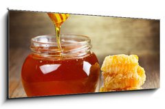 Obraz 1D panorama - 120 x 50 cm F_AB61593982 - jar of honey with honeycomb