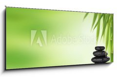 Skleněný obraz 1D panorama - 120 x 50 cm F_AB71092838 - Spa background with stacked massage stones and bamboo - Lázně pozadí s skládané masážní kameny a bambus